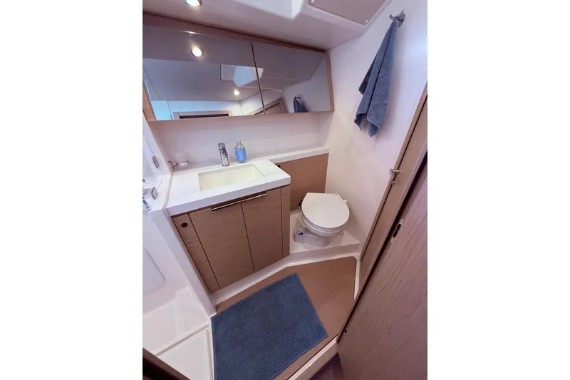 Slide: The Image of Modern bathroom in 2022 Beneteau Oceanis Yacht 54, featuring sleek design and amenities. - 48