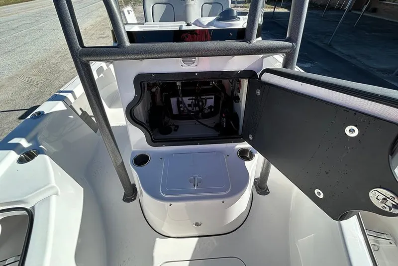 Slide: The Image of 2026 Sea Pro 210 Bay boat interior with open storage compartment. - 15