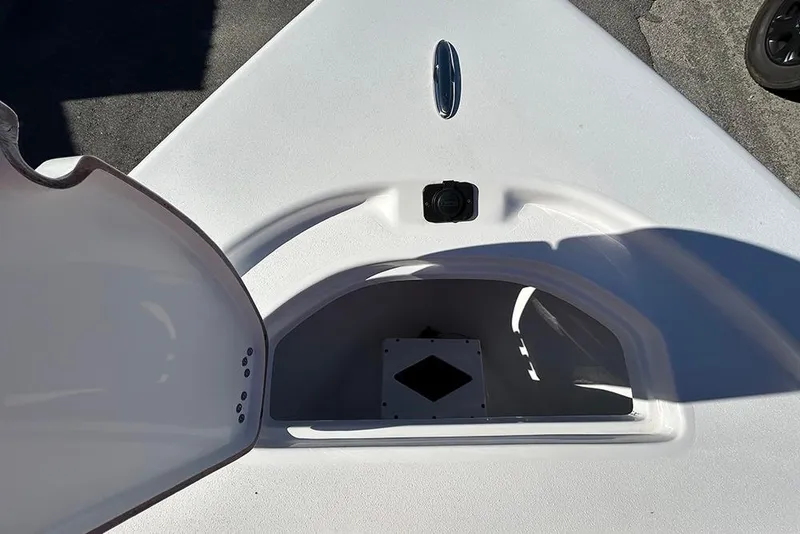 Slide: The Image of 2026 Sea Pro 210 Bay boat storage compartment with open hatch, showcasing interior space. - 18