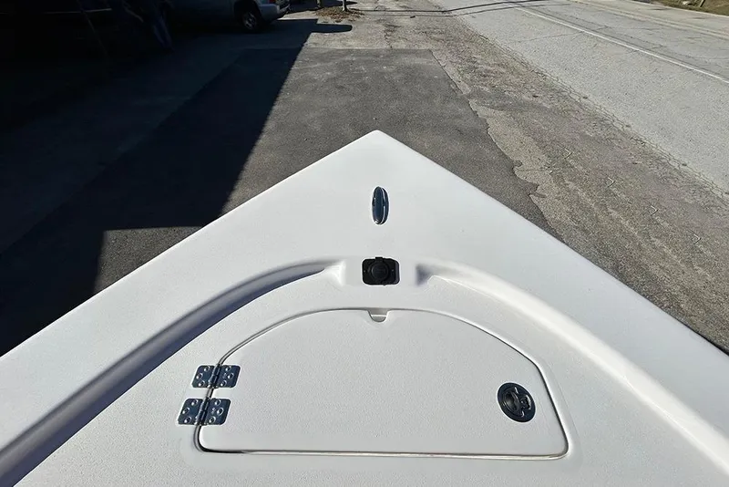 Slide: The Image of Bow view of 2026 Sea Pro 210 Bay boat on pavement. - 19