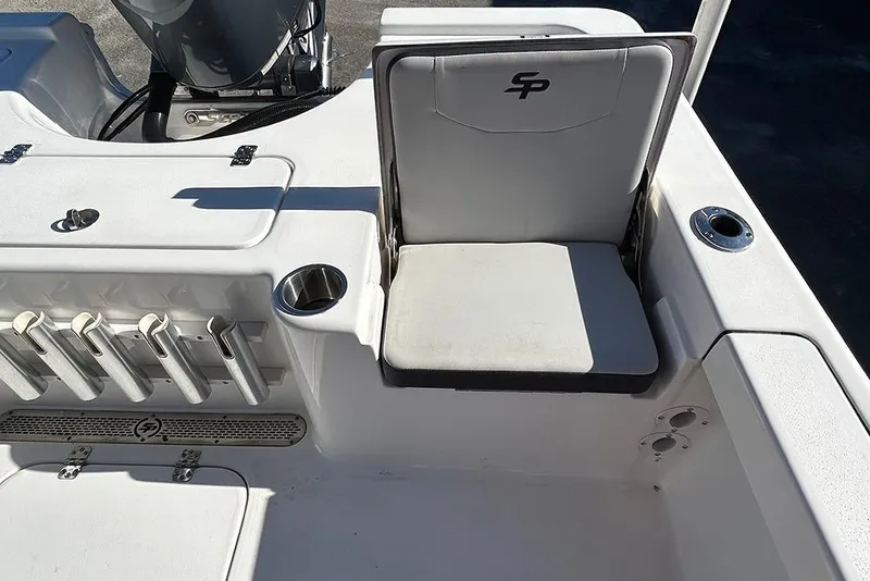 Slide: The Image of 2026 Sea Pro 210 Bay boat interior with seating and rod holders. - 39