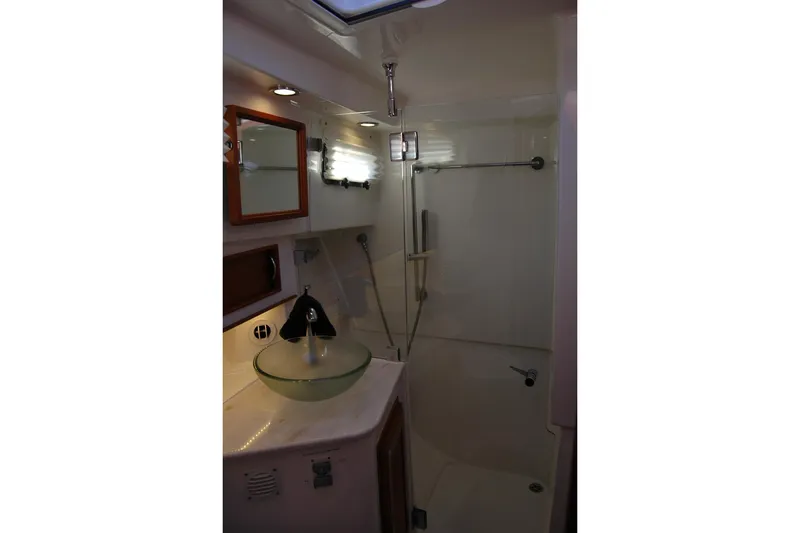 Slide: The Image of 2019 Sabre 38 Salon Express bathroom with glass sink and shower. - 101