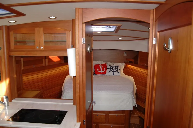 Slide: The Image of Interior of 2019 Sabre 38 Salon Express yacht, featuring cozy wooden cabin and nautical decor. - 106