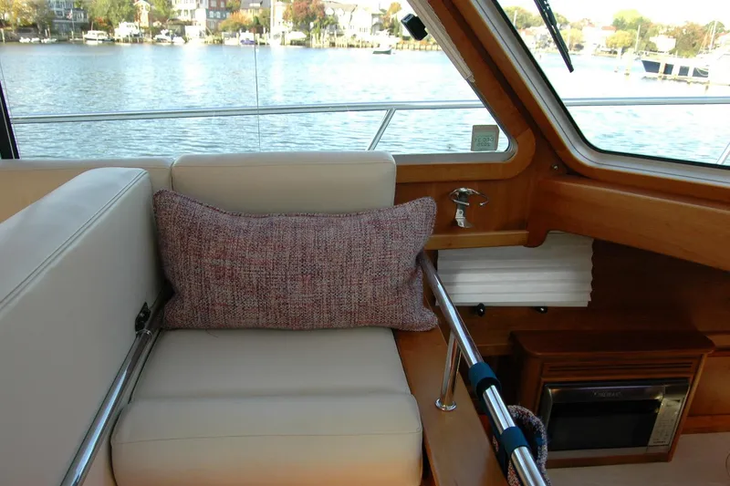 Slide: The Image of Interior of 2019 Sabre 38 Salon Express yacht with comfortable seating and scenic water view. - 109