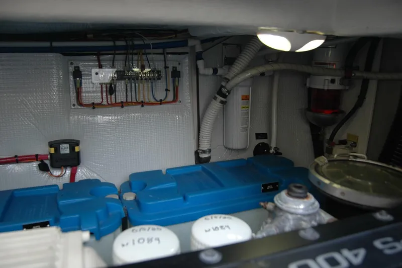 Slide: The Image of Engine room of 2019 Sabre 38 Salon Express with wiring and components. - 115