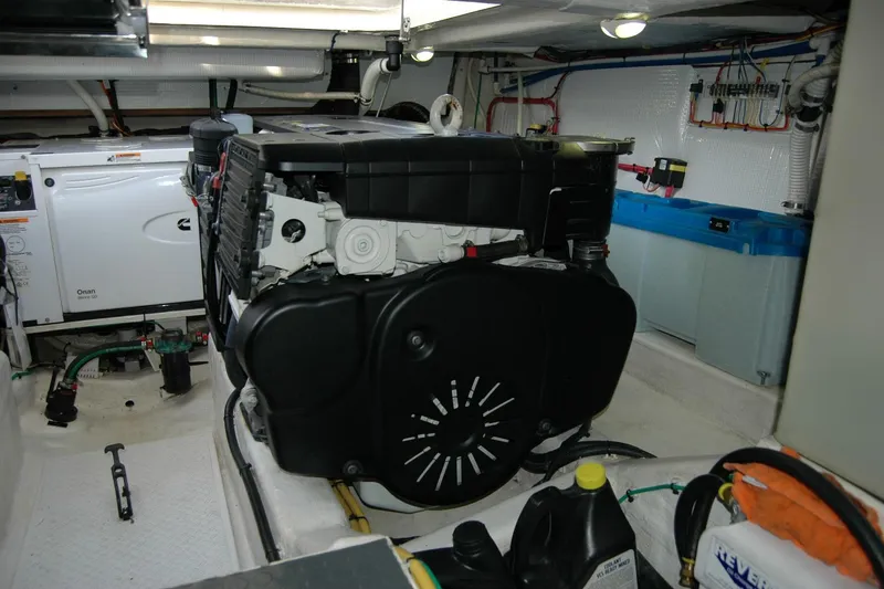 Slide: The Image of Engine room of 2019 Sabre 38 Salon Express with visible machinery and equipment. - 125