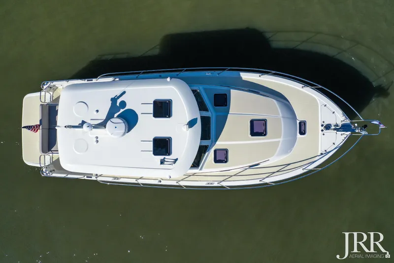 Slide: The Image of Overhead view of 2019 Sabre 38 Salon Express yacht on water. - 24