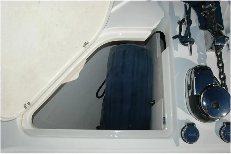 Slide: The Image of Storage compartment on 2019 Sabre 38 Salon Express boat with marine equipment. - 28