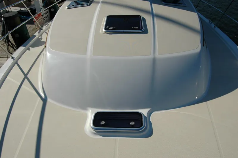 Slide: The Image of 2019 Sabre 38 Salon Express yacht deck with hatches and railing. - 36