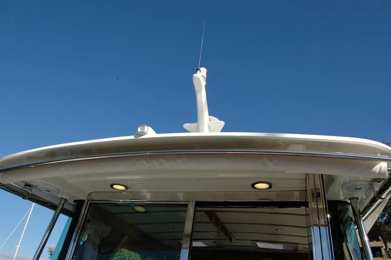 Slide: The Image of 2019 Sabre 38 Salon Express yacht roof against clear blue sky. - 48