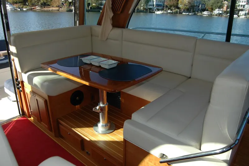 Slide: The Image of Luxurious interior of 2019 Sabre 38 Salon Express yacht with elegant seating and table. - 58