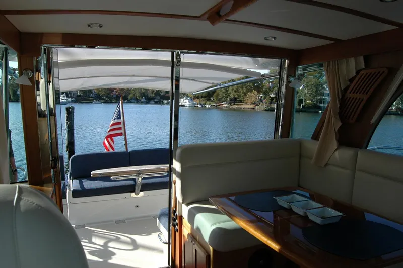 Slide: The Image of Interior view of 2019 Sabre 38 Salon Express yacht with lake backdrop. - 60