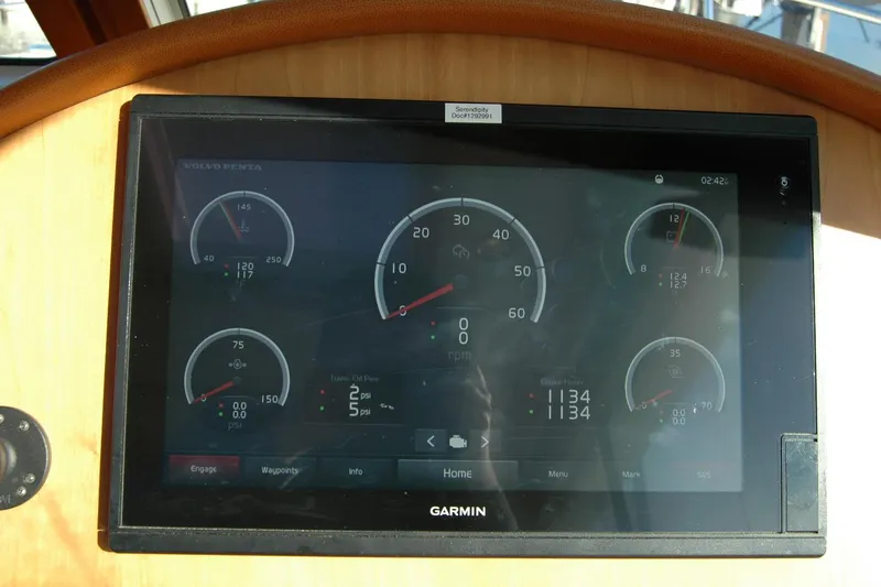 Slide: The Image of Dashboard display of 2019 Sabre 38 Salon Express with Garmin interface and gauges. - 66