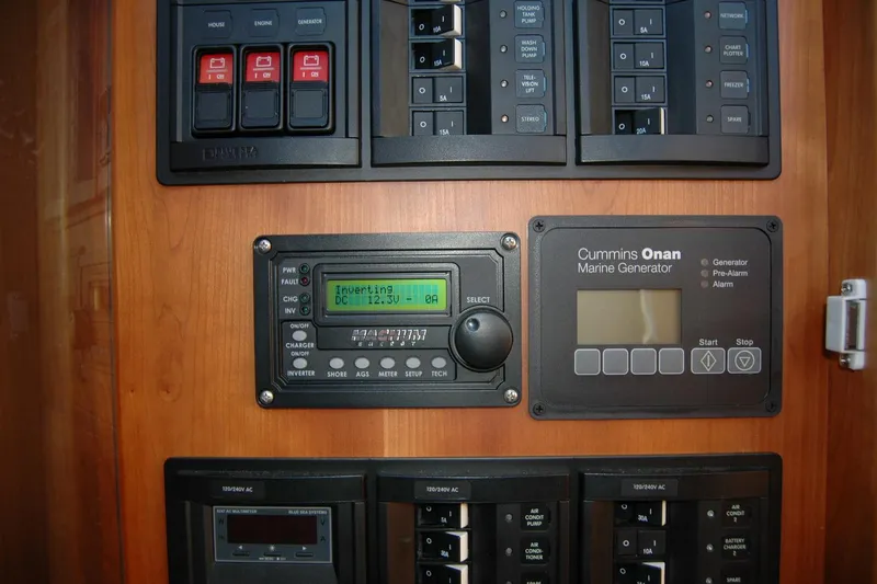 Slide: The Image of Control panel of a 2019 Sabre 38 Salon Express with Cummins Onan Marine Generator. - 72