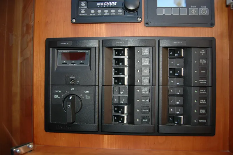 Slide: The Image of Electrical control panel on a 2019 Sabre 38 Salon Express yacht. - 74