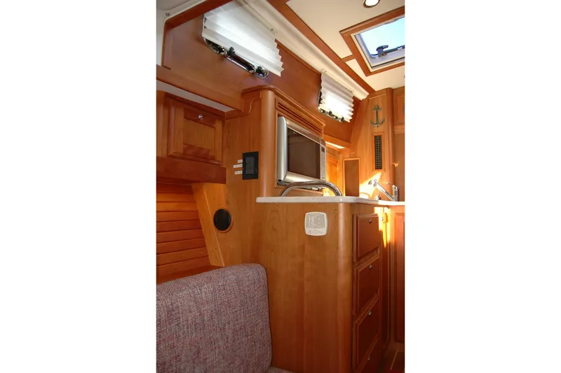 Slide: The Image of Interior of 2019 Sabre 38 Salon Express yacht with wood cabinetry and modern amenities. - 87