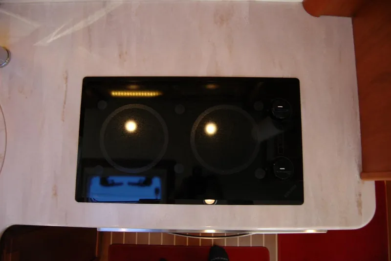 Slide: The Image of Stovetop in 2019 Sabre 38 Salon Express yacht kitchen. - 88