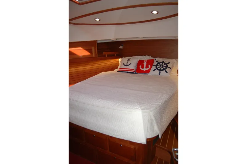 Slide: The Image of Cozy bedroom in 2019 Sabre 38 Salon Express with nautical-themed pillows. - 98