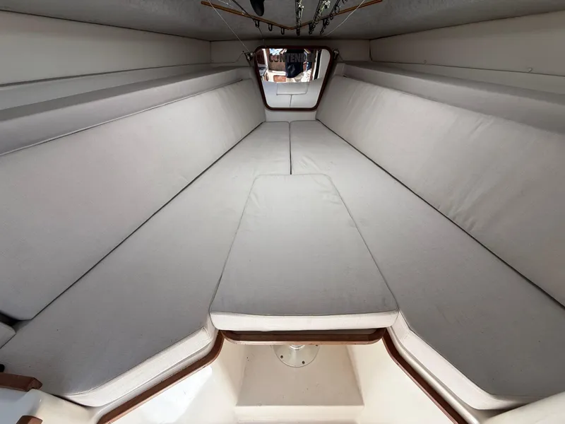 Slide: The Image of Interior view of 2000 Contender 35 Side Console boat with cushioned seating. - 47