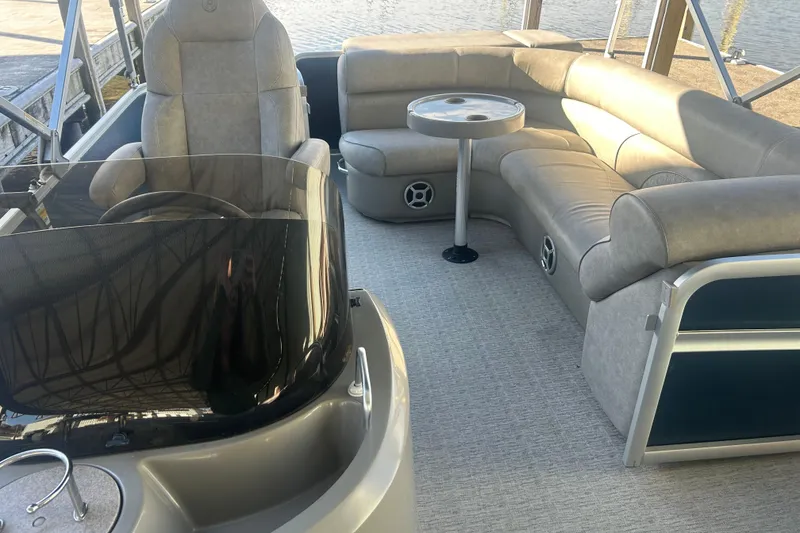 Slide: The Image of Close-up of 2019 Premier 240 SunSation pontoon boat hull with registration number. - 15