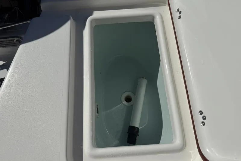 Slide: The Image of 2021 Sea Pro 172 Bay boat livewell with drain and pipe attachment. - 12