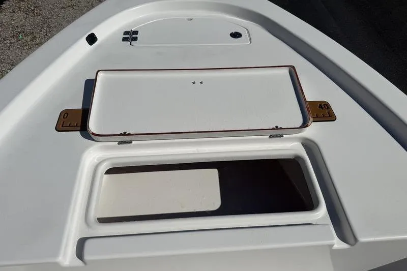 Slide: The Image of 2021 Sea Pro 172 Bay boat deck with storage compartments. - 4