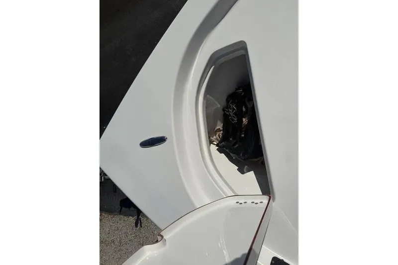 Slide: The Image of 2021 Sea Pro 172 Bay boat storage compartment with open hatch. - 5