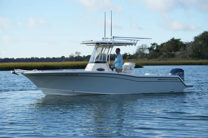 Slide: The Image of 2020 Grady-White Fisherman 236 boat on calm water, side view. - 11