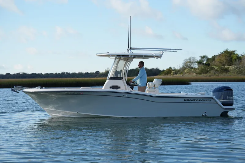 Slide: The Image of 2020 Grady-White Fisherman 236 boat on calm water, side view. - 12