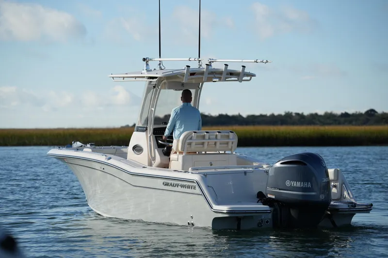Slide: The Image of 2020 Grady-White Fisherman 236 boat with Yamaha engine on calm water. - 15