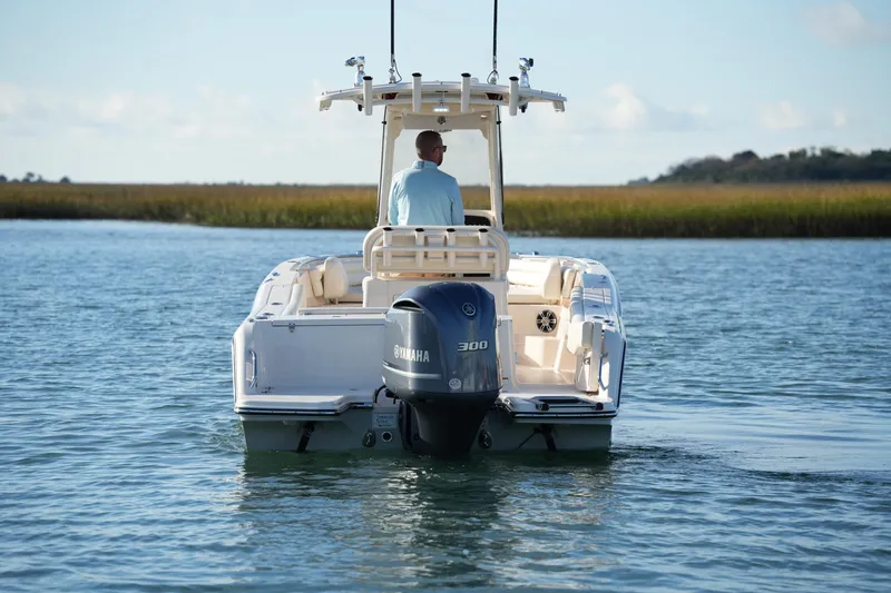 Slide: The Image of 2020 Grady-White Fisherman 236 boat with Yamaha engine on calm water. - 16