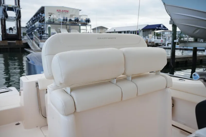 Slide: The Image of 2020 Grady-White Fisherman 236 boat seating at marina, showcasing luxury and comfort. - 23