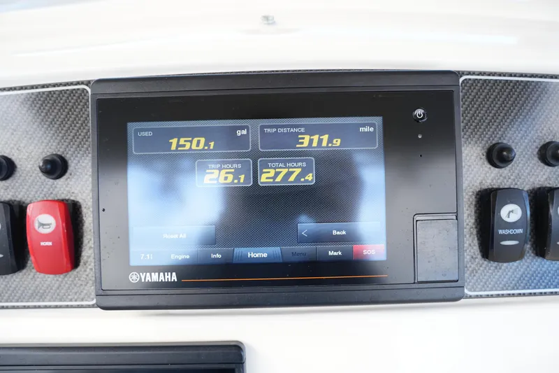 Slide: The Image of Yamaha display on 2020 Grady-White Fisherman 236 showing fuel and trip data. - 30
