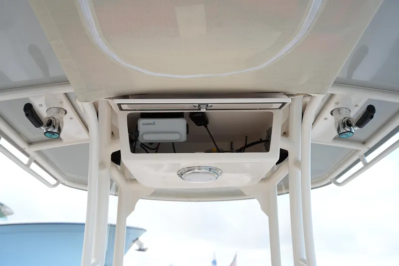 Slide: The Image of 2020 Grady-White Fisherman 236 boat console with Garmin equipment and rod holders. - 31