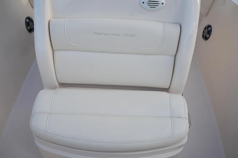 Slide: The Image of 2020 Grady-White Fisherman 236 boat seat, white upholstery, sleek design. - 36