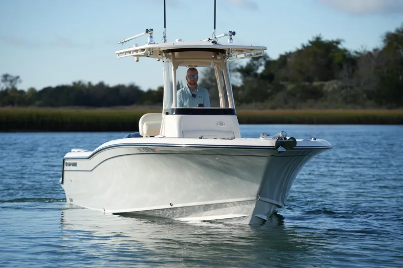 Slide: The Image of 2020 Grady-White Fisherman 236 boat cruising on calm water. - 6
