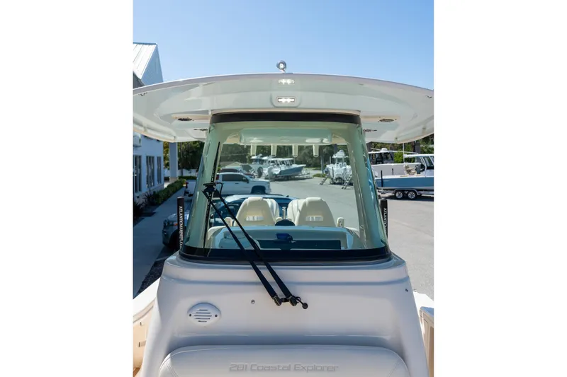 Slide: The Image of 2026 Grady-White 281 Coastal Explorer boat, front view with windshield and wipers. - 10