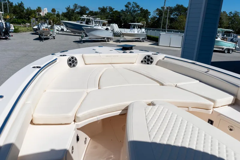 Slide: The Image of 2026 Grady-White 281 Coastal Explorer boat with spacious seating and modern design. - 16