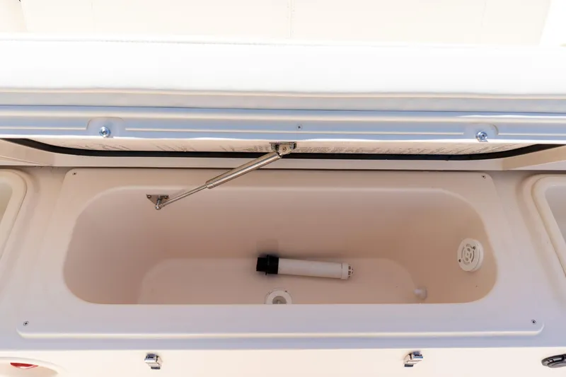 Slide: The Image of Open storage compartment on 2026 Grady-White 281 Coastal Explorer boat. - 24
