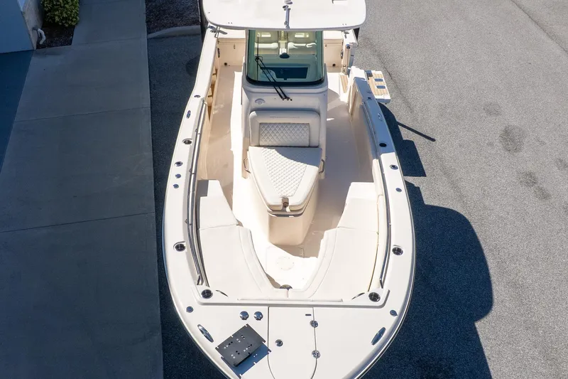 Slide: The Image of 2026 Grady-White 281 Coastal Explorer boat, aerial view, showcasing spacious deck and seating. - 3