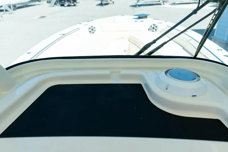 Slide: The Image of Dashboard view of 2026 Grady-White 281 Coastal Explorer boat, featuring sleek design elements. - 37