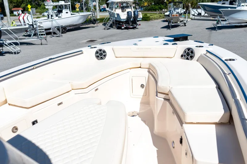 Slide: The Image of 2026 Grady-White 281 Coastal Explorer boat interior with spacious seating and modern design. - 38
