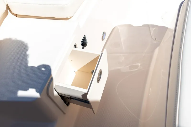 Slide: The Image of 2026 Grady-White 281 Coastal Explorer boat interior storage compartment open. - 39