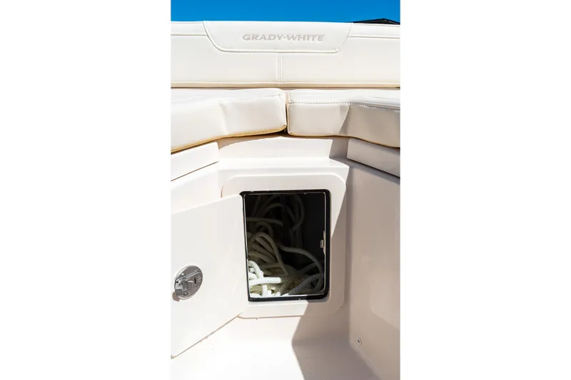 Slide: The Image of 2026 Grady-White 281 Coastal Explorer boat storage compartment with rope. - 41