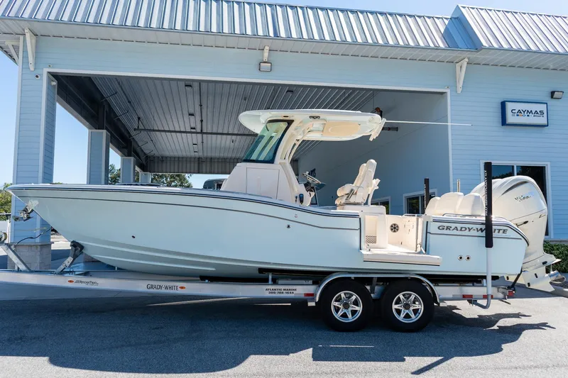 Slide: The Image of 2026 Grady-White 281 Coastal Explorer boat on trailer at dealership. - 6