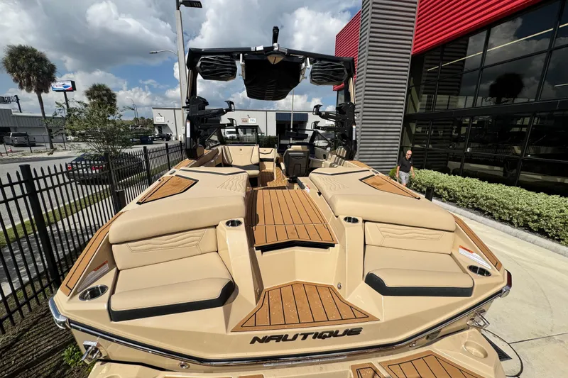 Slide: The Image of 2026 Nautique Super Air Nautique G23 Paragon boat with luxurious seating and sleek design. - 8