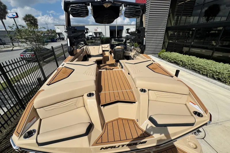 Slide: The Image of 2026 Nautique Super Air Nautique G23 Paragon boat with luxurious seating and sleek design. - 9
