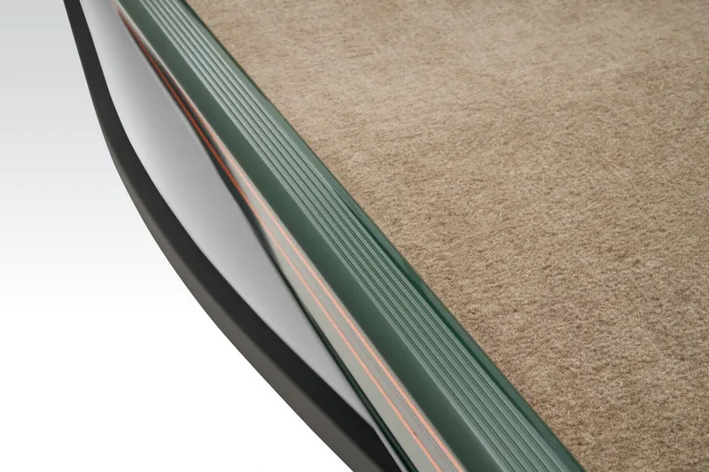 Slide: The Image of Manufacturer Provided Image: 2026 Tracker Bass Tracker Classic Limited boat interior with carpeted flooring detail. - 26