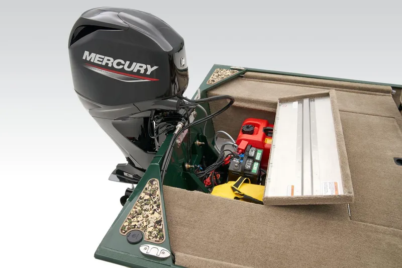 Slide: The Image of Manufacturer Provided Image: 2026 Tracker Bass Tracker Classic Limited boat with Mercury outboard motor and open storage compartment. - 52