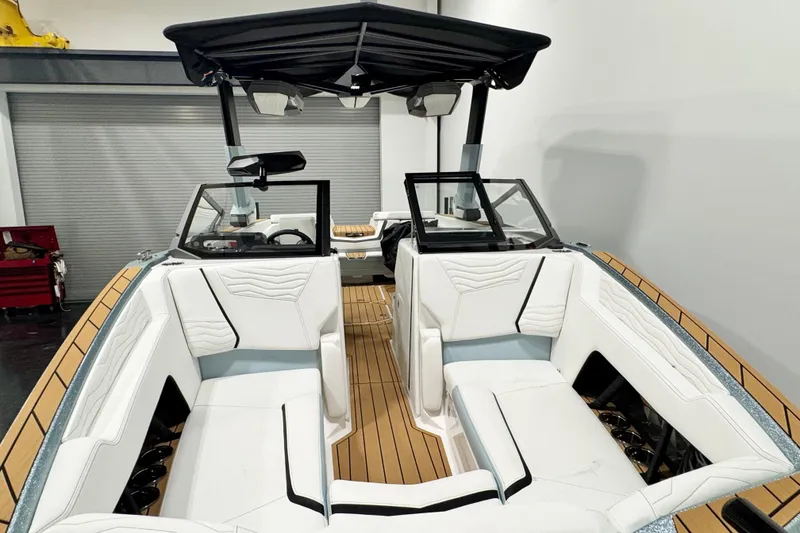 Slide: The Image of 2026 Nautique Super Air Nautique G23 Paragon interior with white seating and sleek design. - 5